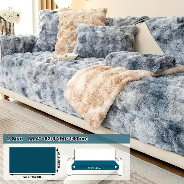 Luxurious Gradient Velvet Sofa Cover by topspet on a blue-gray sofa with a beige throw blanket