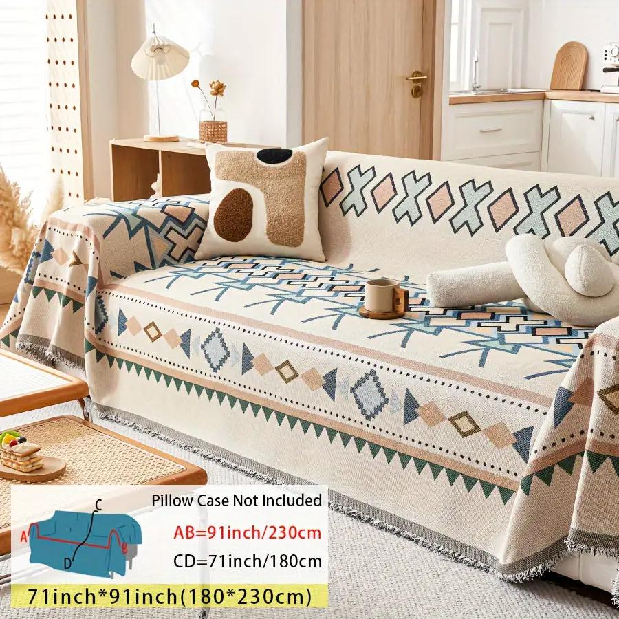 Extra Large sofa cover by topspet; stretchable furniture protector in blue and beige geometric pattern.