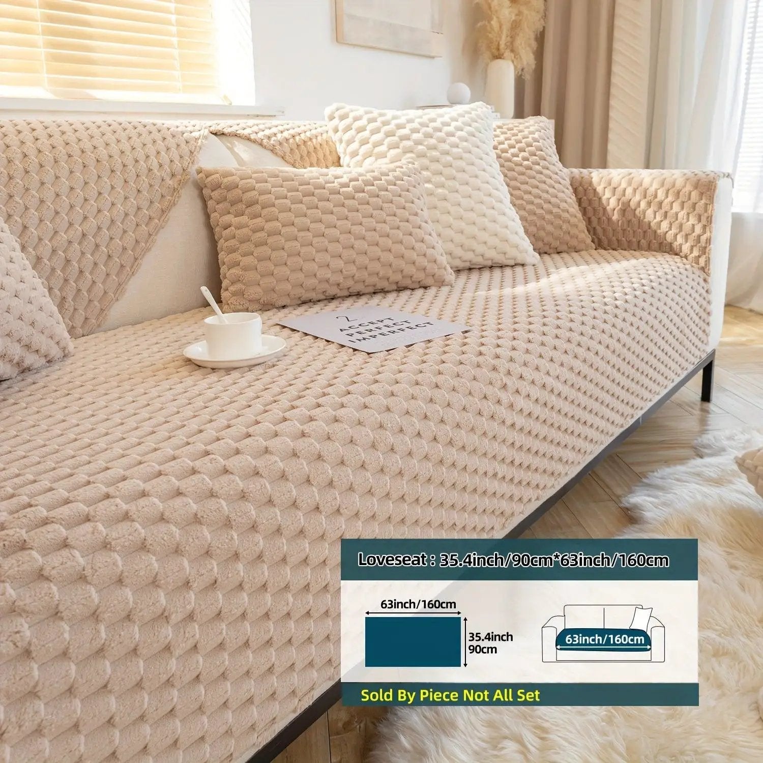 Plush Nordic sofa slipcover in beige knit with matching cushions on a cream loveseat