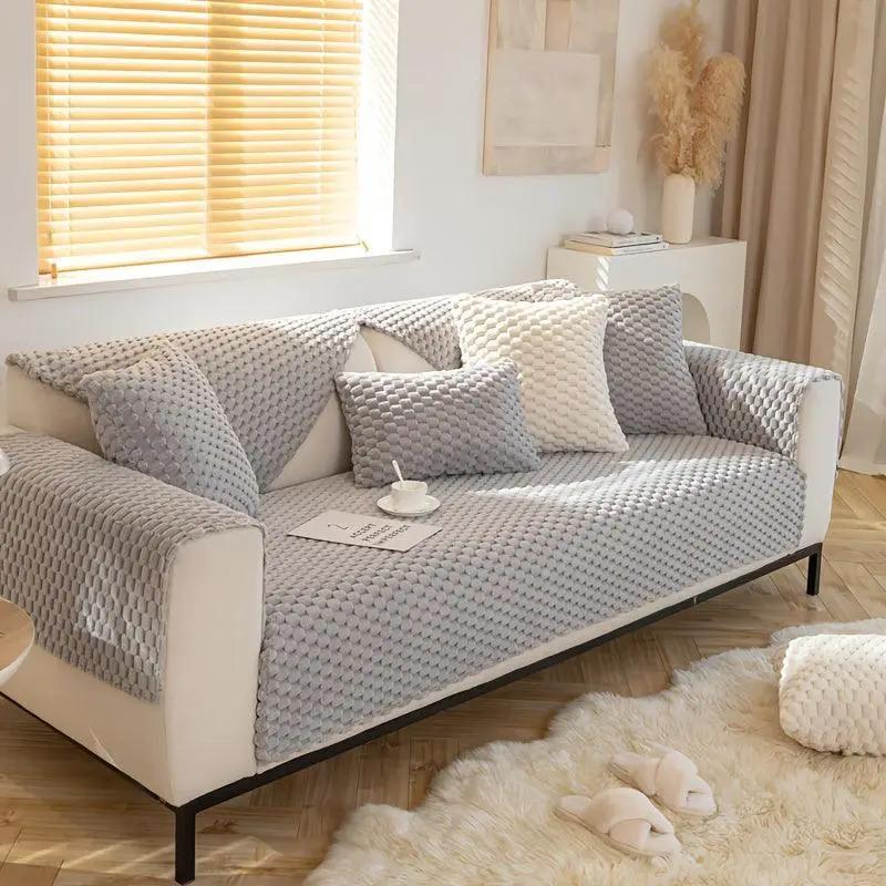 Plush Nordic Sofa Slipcover by topspet in light gray knit with matching cushions on a white sofa in a sunny living room