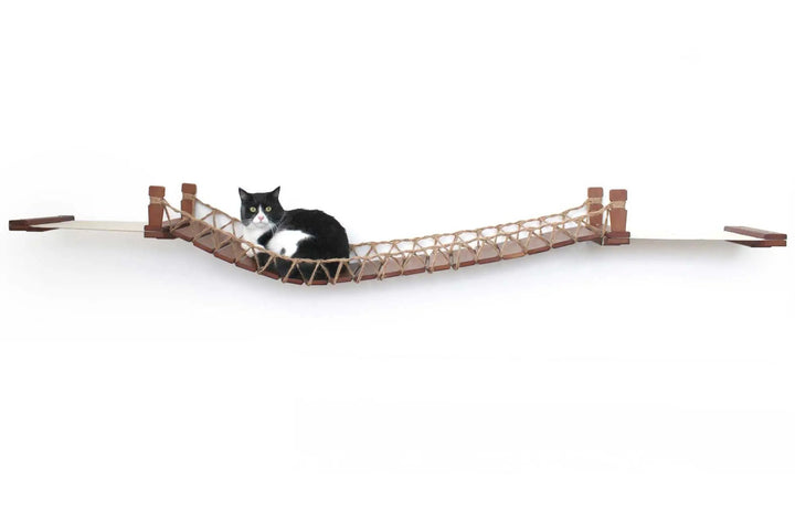Double Cat Hammock and Climbing Bridge Combo by Catastrophic Creations, wooden frame with rope netting and a tuxedo cat.