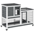 Load image into Gallery viewer, PawHut wooden rabbit hutch elevated bunny cage, white and gray frame, two levels with wire mesh doors and casters.
