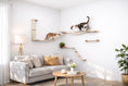 Load image into Gallery viewer, The Bunker - Multi Level Cat Tree with Perch by Catastrophic Creations, beige shelves, wall-mounted, two cats.
