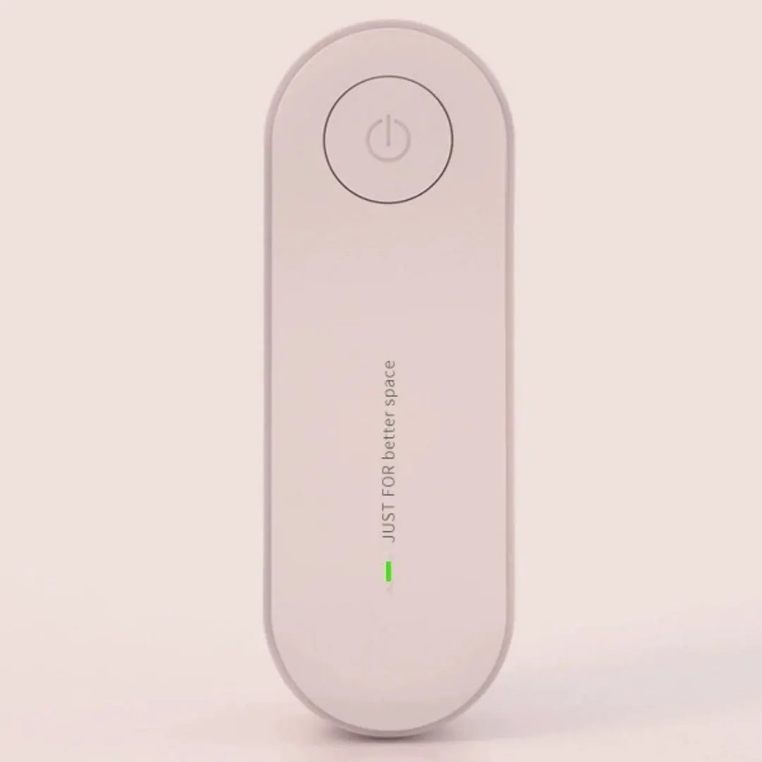 Pet Zen Ultrasonic Mite & Mosquito Repeller for Pets, pink handheld device with power button