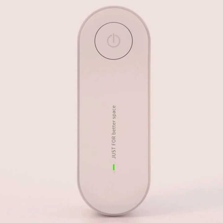Pet Zen Ultrasonic Mite &amp; Mosquito Repeller for Pets, pink handheld device with power button