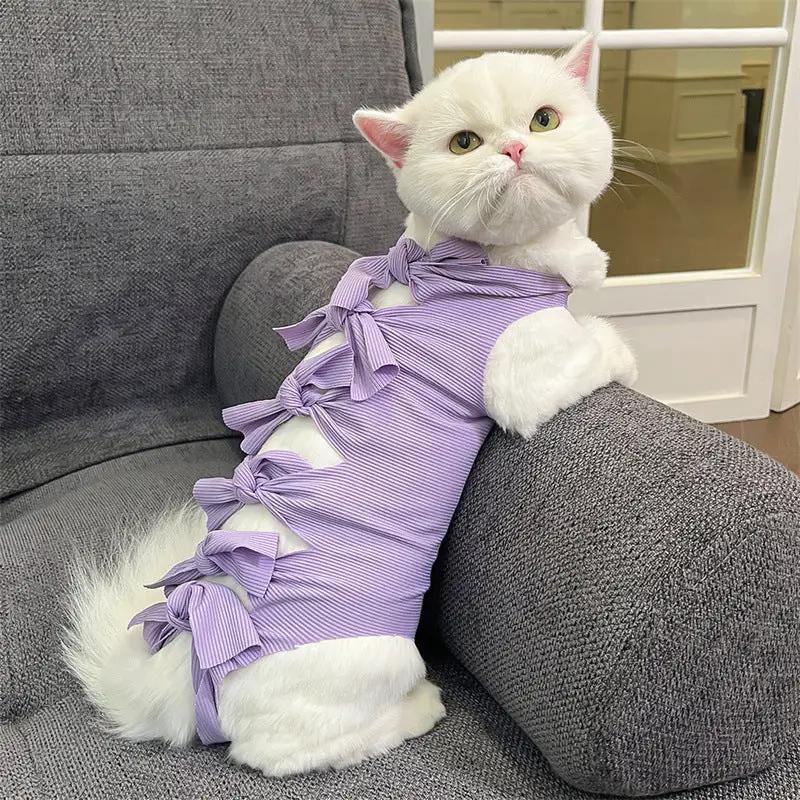 Lace-up cat recovery wear; lavender striped polyester with decorative bows along the back.