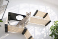 Carica l'immagine nel visualizzatore della galleria, The Play Cat Condo by Catastrophic Creations; beige platform cat tree with black corner supports and circular cutout.
