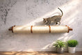 Carica l'immagine nel visualizzatore della galleria, Horizontal cat scratching post by Catastrophic Creations; beige sisal rope with wooden ends
