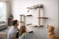 Load image into Gallery viewer, The Catacombs Cat Tree Scratching Post System cat condo by Catastrophic Creations on wall with rope-wrapped posts.
