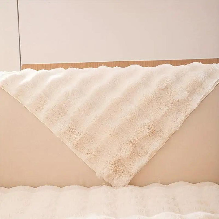 Molly Mutt Couch Cover by topspet; plush cream sofa protector with non-slip backing.