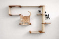 Charger l'image dans la visionneuse de la galerie, The Climb Condo Cat Wall Climbing System by Catastrophic Creations; beige wood and sisal posts, two cats.
