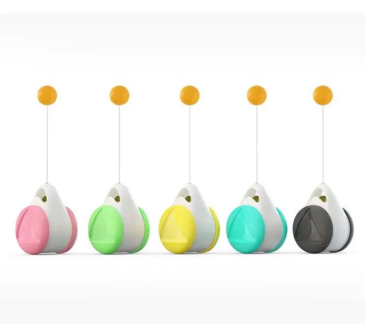 Orbit Wobble Cat Toy color options shown together: pink, green, yellow, turquoise blue, and black; one toy included