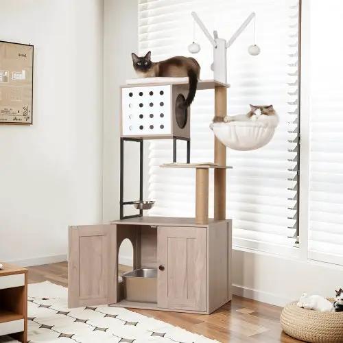 Haven Loft Cat Tower with wood-look litter box cabinet, upper hideaway, and cats resting on the top platform and hammock.