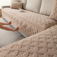 Load image into Gallery viewer, L-shaped couch cover in beige fabric being fitted over a sofa
