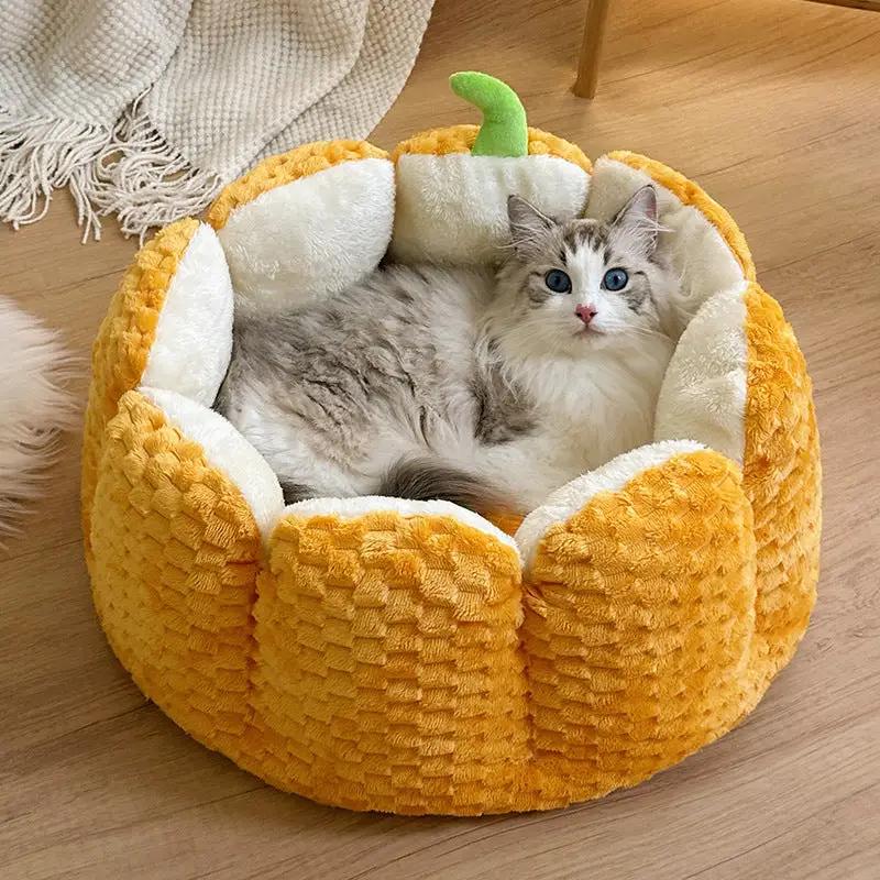 Pumpkin Nest plush cat bed, orange with cream lining, Halloween-themed cozy pet mat