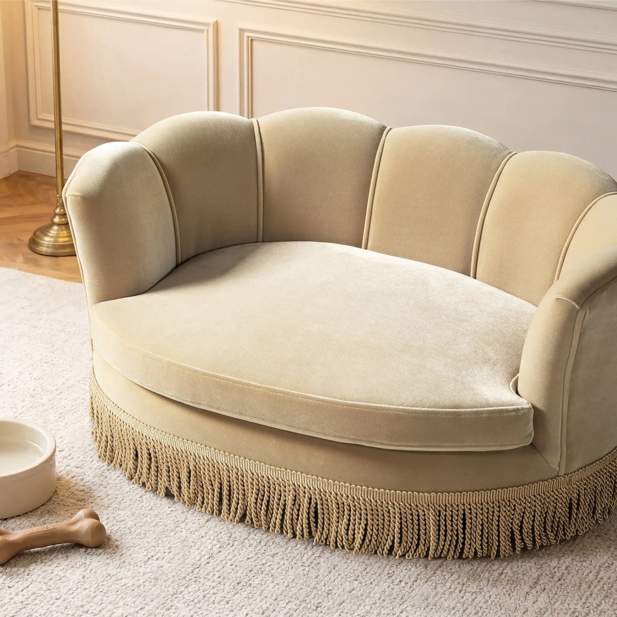 Clara 34.5in Scalloped Pet Sofa Bed by Home Furnishers; beige fawn fabric with fringe trim.