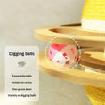 Load image into Gallery viewer, Cat digging ball toy, pink and white perforated plastic sphere on a wooden multi-level scratching post
