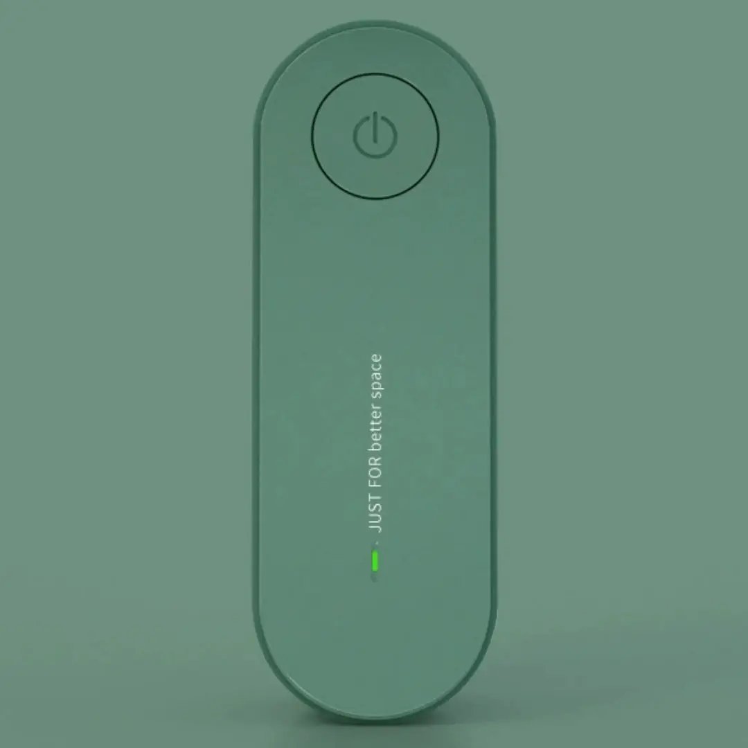 Ultrasonic Mite & Mosquito Repeller For Pets in green, compact handheld Pet Supplies device with circular power button.