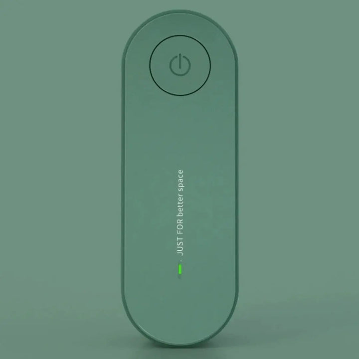 Ultrasonic Mite &amp; Mosquito Repeller For Pets in green, compact handheld Pet Supplies device with circular power button.
