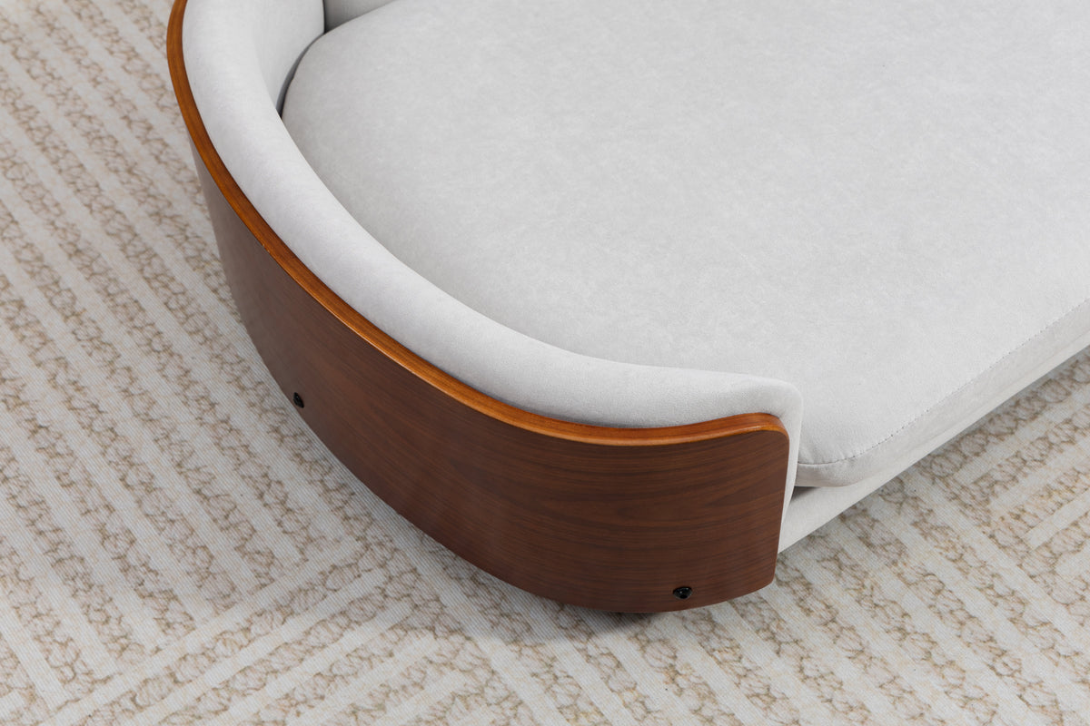Scandinavian style elevated dog bed by Home Furnishers with solid wood legs and light gray cushion