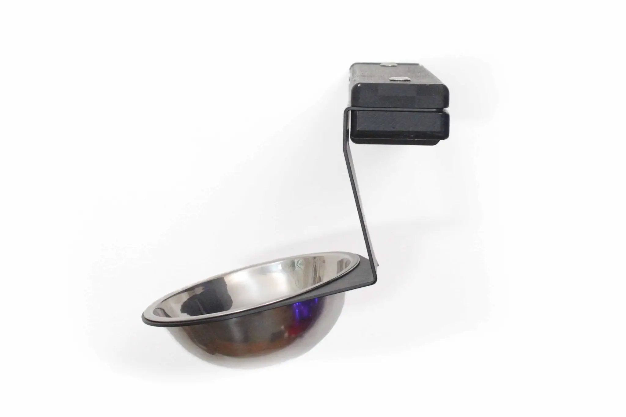 Wall-mounted cat feeding shelf by Catastrophic Creations with black metal frame and stainless steel bowl