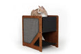 Load image into Gallery viewer, The Grotto short cat condo for small spaces in wood finish with gray scratching panel and lower shelf
