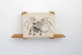 Carica l'immagine nel visualizzatore della galleria, Cat Cubby for Wall - Covered Cat Bed by Catastrophic Creations, beige fabric with dragon illustration.
