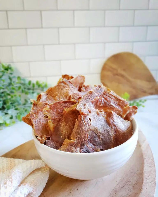 Turkey thigh meat, fat trimmed thin-cut, Naked Beasts in white bowl