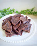 Load image into Gallery viewer, Angus Beef Patty Quarters, gluten-free and free-range beef squares on a plate
