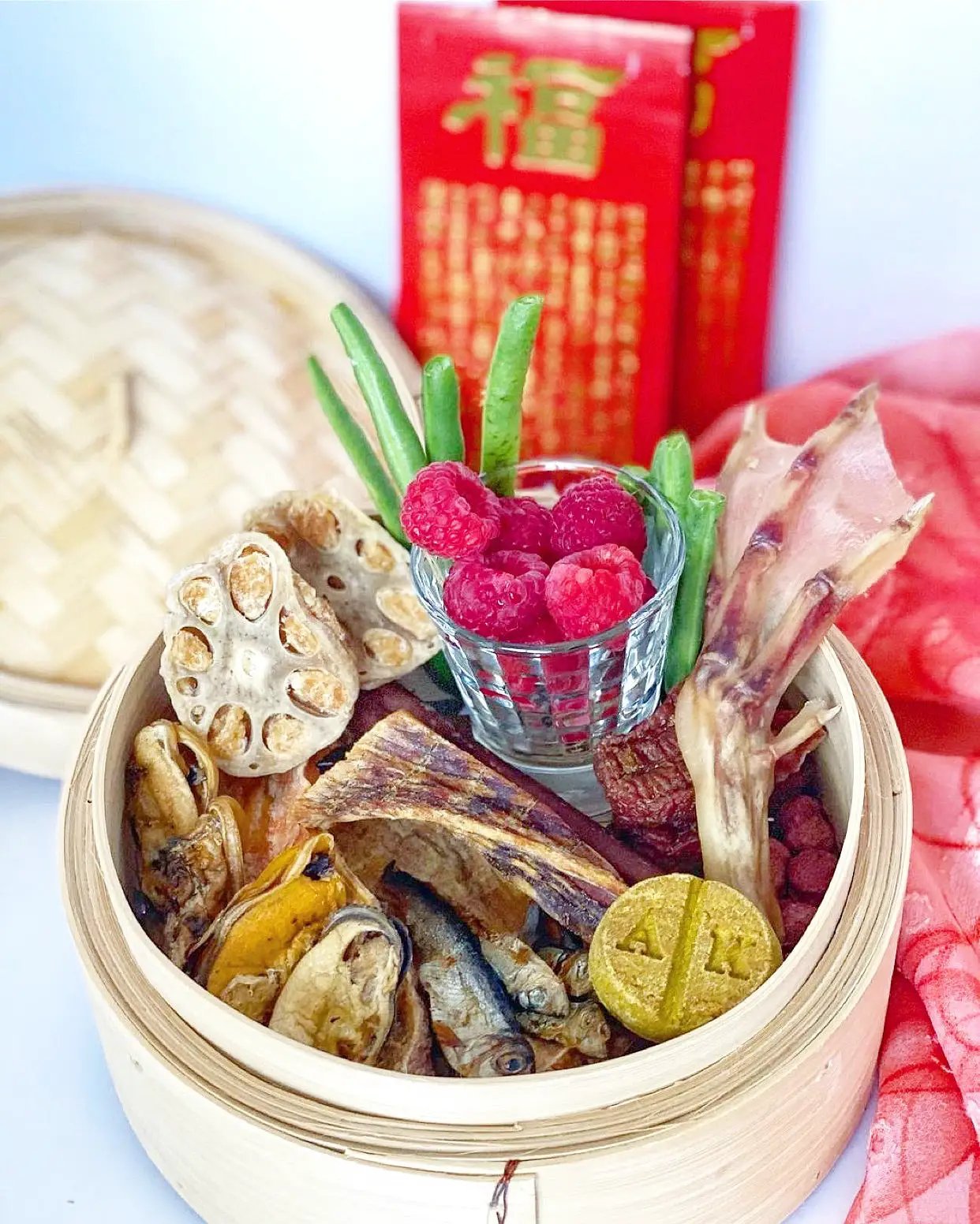 Green Lipped Mussels small animal treats by Naked Beasts in a bamboo steamer with dried morsels