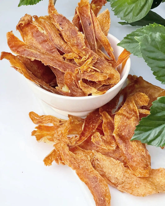 Naked Beasts Turkey Breast Thin-Cut jerky slices in a white bowl