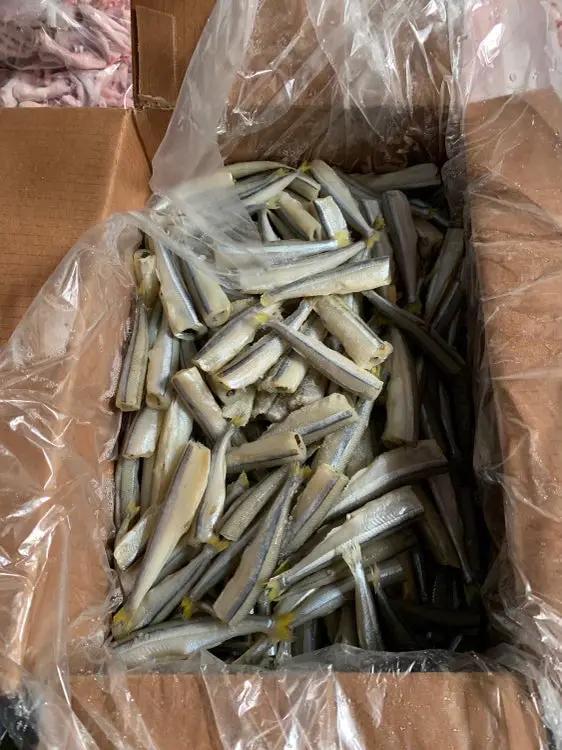 Smelt (wild-caught), Naked Beasts brand frozen fish pieces in a cardboard box