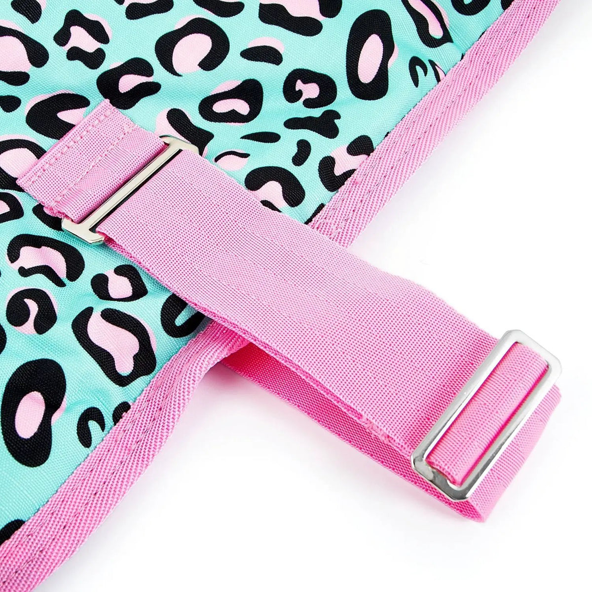 Jeffers Expression 600D Ripstop waterproof dog coat with teal leopard print and pink adjustable straps