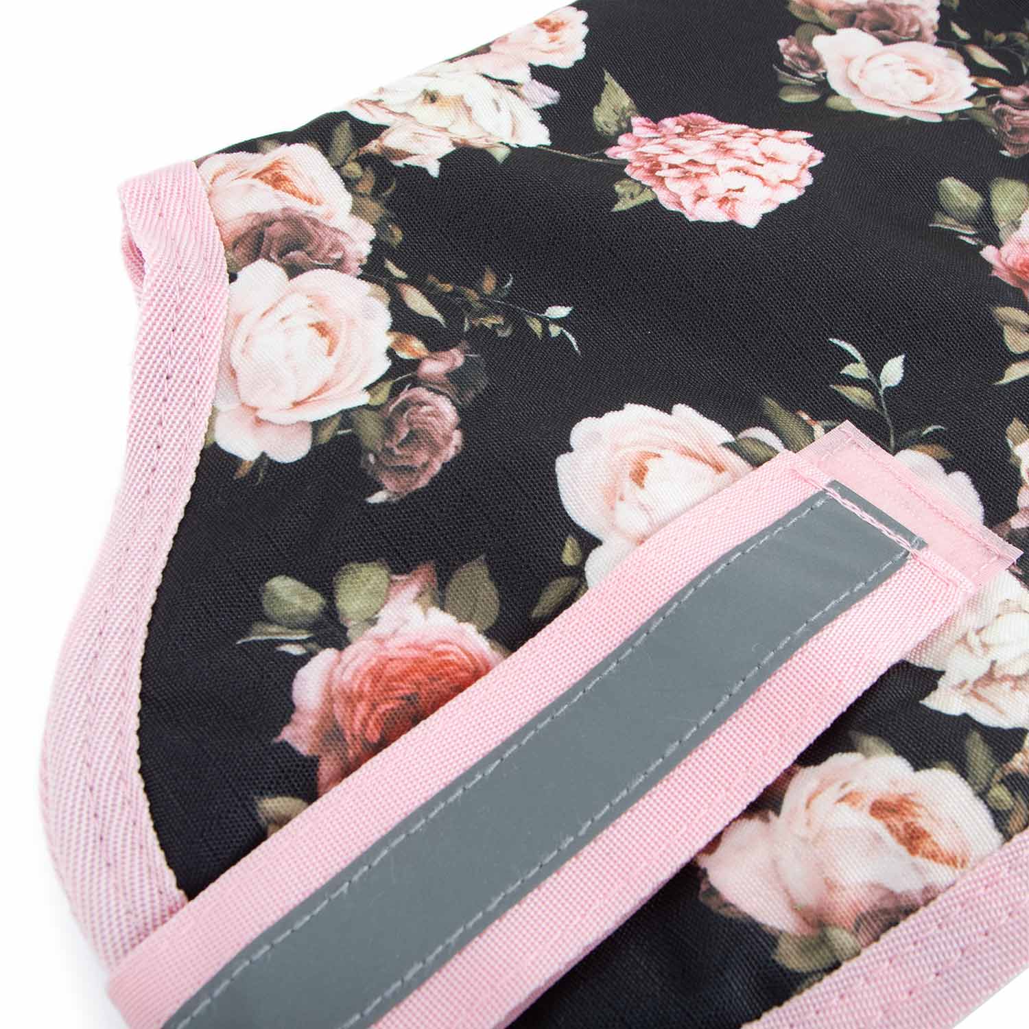 Jeffers 600D waterproof ripstop dog coat with floral black fabric, pink trim, and gray reflective strap