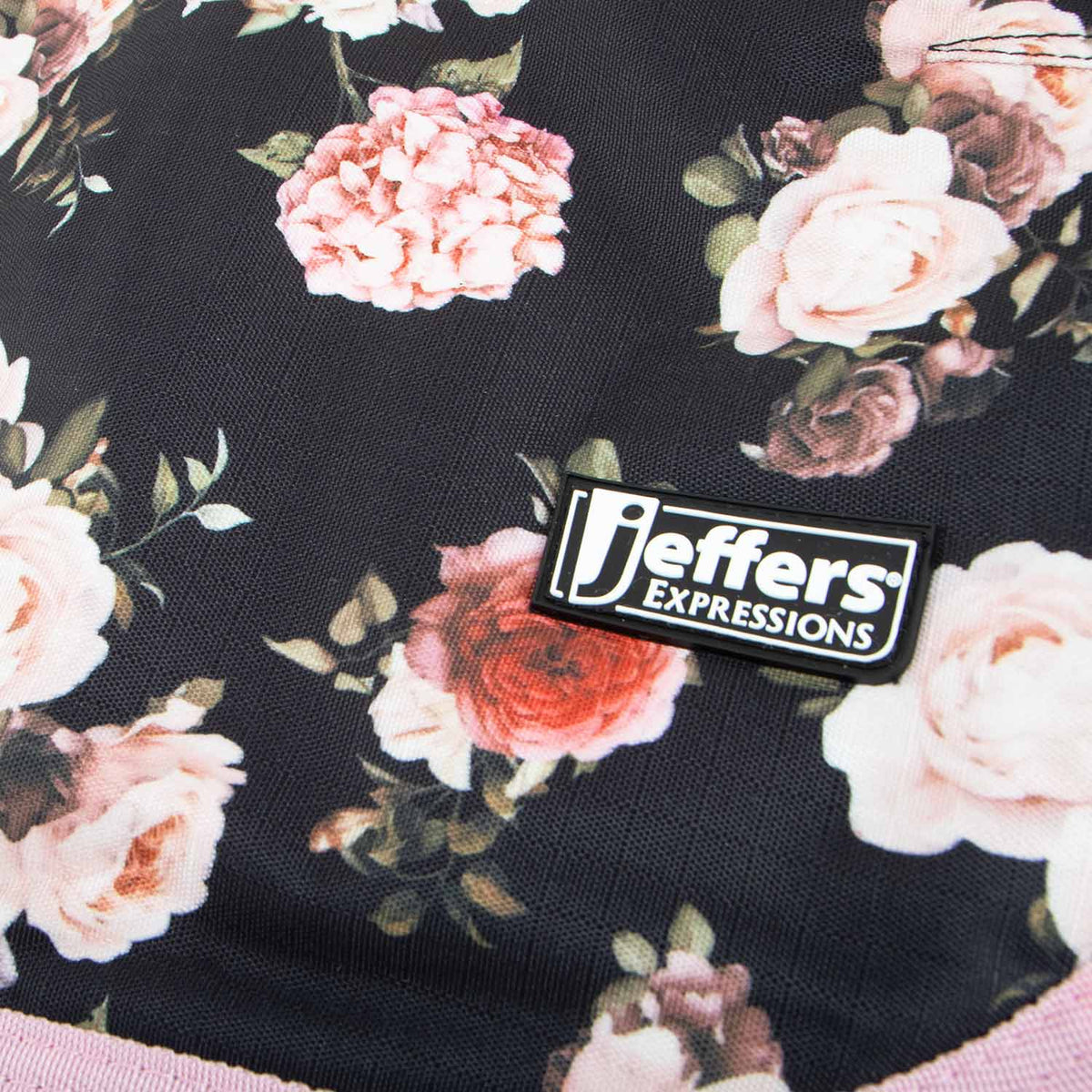 Jeffers Expressions dog coat with pink floral pattern on dark fabric and brand label