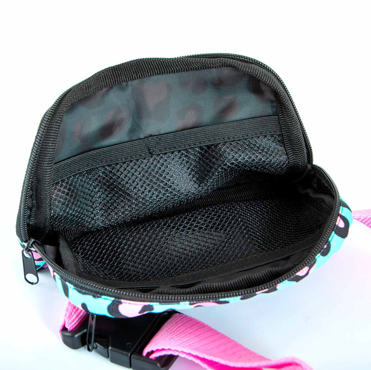 Jeffers Expression adjustable strap belt bag, colorful printed fanny pack with pink strap and black mesh interior.