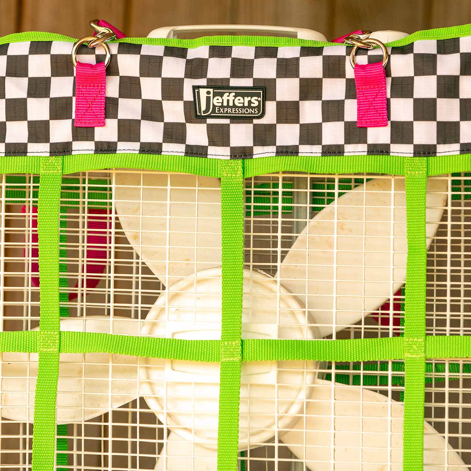 Jeffers Expressions horse fan bag with black-and-white checkered fabric, neon green straps, and visible logo patch.
