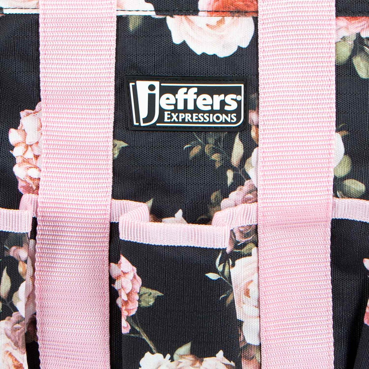 Jeffers Expressions Deluxe Horse Grooming Bag with adjustable strap; black floral bag with pink straps.