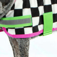 Carica l'immagine nel visualizzatore della galleria, Jeffers Expression Moisture-Wicking Fleece Dog Coat with neon green straps and pink trim on black-and-white plaid.
