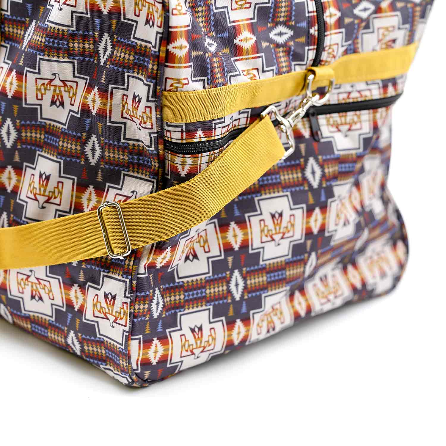 Jeffers Expression Equestrian nylon gear bag duffel with yellow strap and bold geometric print.