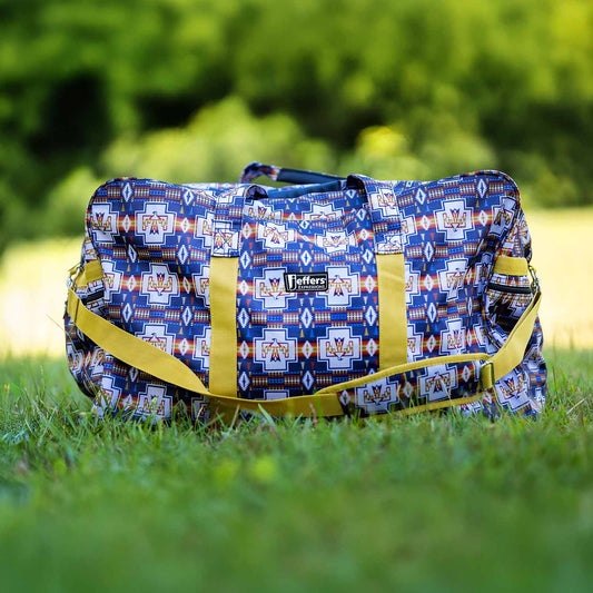 Jeffers Expression Equestrian nylon gear bag duffel with blue geometric pattern and yellow straps.