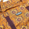 Load image into Gallery viewer, Jeffers Expressions nylon gear bag with orange sunflower print and dark brown straps
