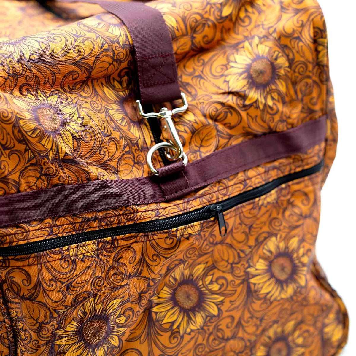 Jeffers Expression Equestrian nylon gear bag in orange sunflower print with maroon straps and hardware