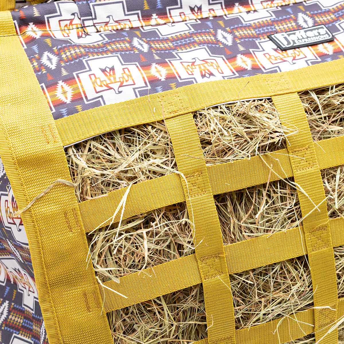 Jeffers Expression Extend-Feed Hay Bag; yellow woven straps with hay visible inside, brand Jeffers.