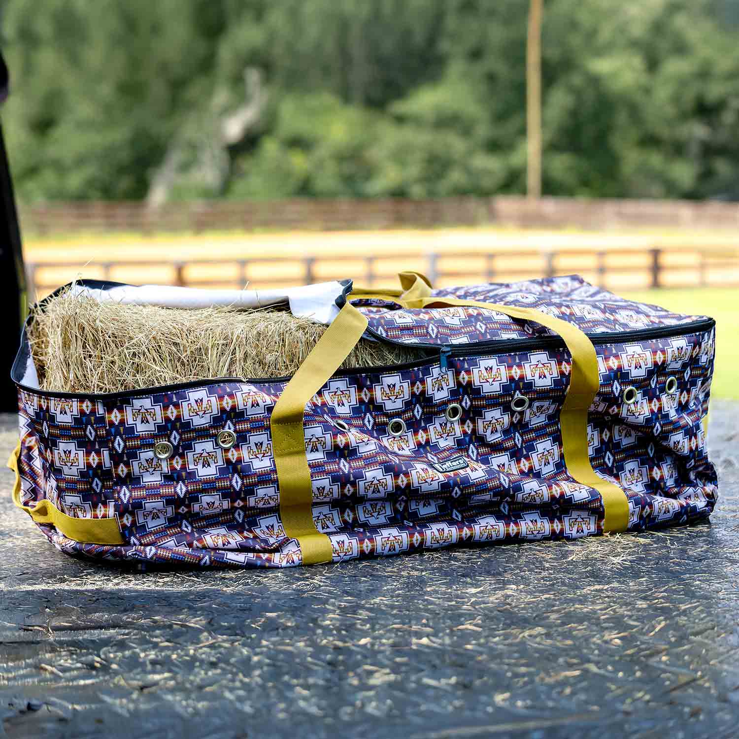 Jeffers Expression Full Hay Bale Tote Bag with blue geometric print and yellow straps, hay bale inside