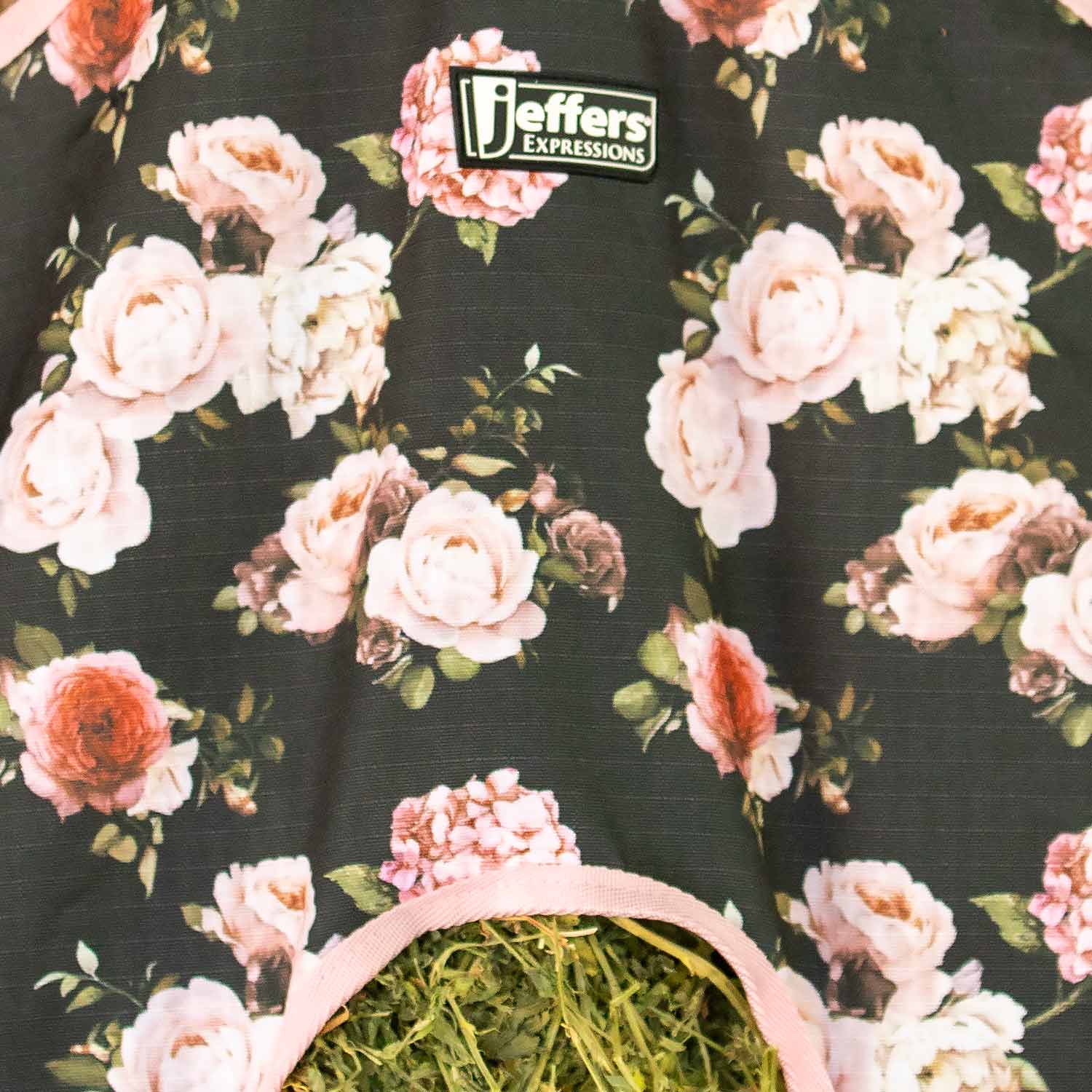 Jeffers Expression top-loading hay bag, 600 Denier, pink trim on floral fabric with hay inside