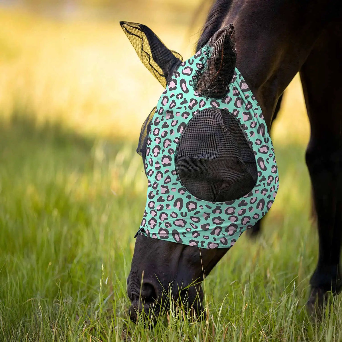 Jeffers Expression Lycra horse fly mask with ears in teal leopard print with black mesh panels.