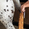 Load image into Gallery viewer, Jeffers Expression Lycra Horse Tail Bag, 24-inch long, white strap visible near a horse’s tail.
