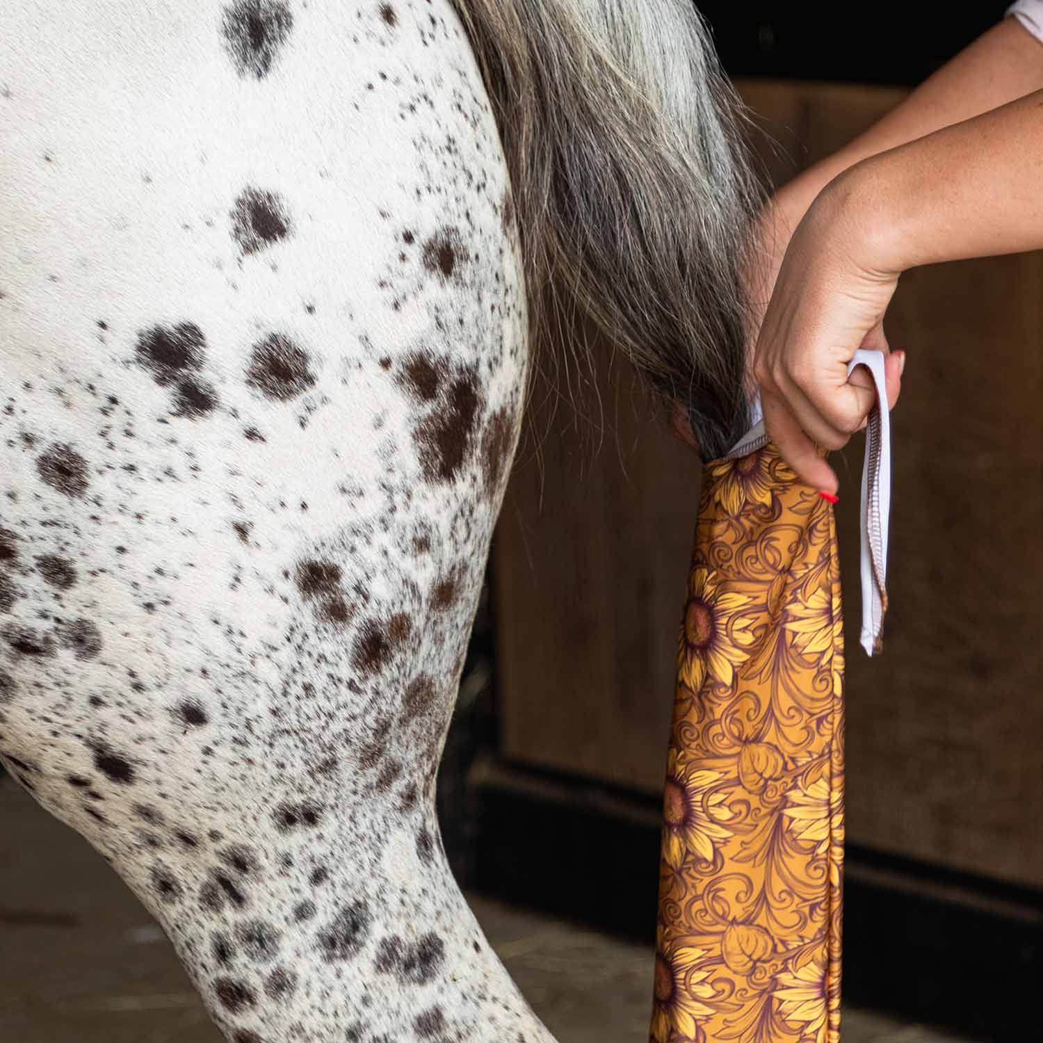 Jeffers Expression Lycra Horse Tail Bag, 24-inch long, white strap visible near a horse’s tail.