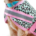 Carica l'immagine nel visualizzatore della galleria, Jeffers Expression Moisture-Wicking Fleece Dog Coat with pink straps and gray reflective stripe on leopard-print fleece

